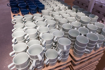 Fototapeta premium Many white plates in the store