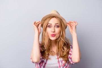 Happy nice-looking young woman smiling with hat