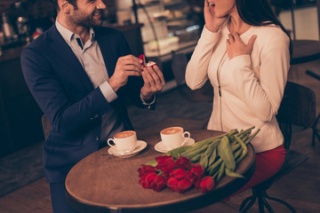 A man making proposal in a cafe