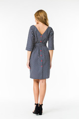 Young elegant female in light summer dress, over white background