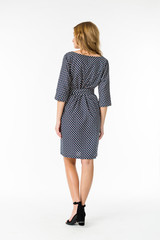 Young elegant female in light summer dress, over white background