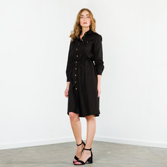 Young elegant female in light summer dress, over white background