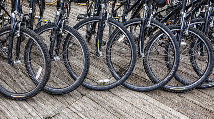 Fototapeta na wymiar Wheel detail of a group of bikes