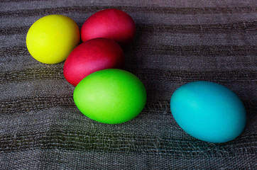 Obraz premium Painted in different colors Easter eggs.