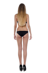Snap model. Full length portrait of young woman wearing black bikini, isolated on white. Beautiful woman body