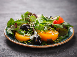 Fresh Green mix Salad with Vegetables, Tomatoes and Microgreen.Leaves Of Spinach,Arugula,Romaine,Lettuce.Concept of Healthy Food.Vegetarian.Copy space for Text. selective focus.