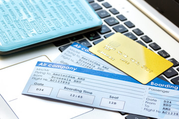 flight tickets payment online with cards on keyboard