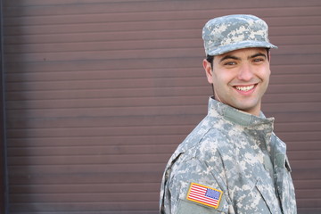 Soldier smiling close up isolated with copy space 