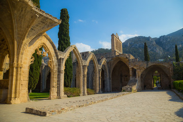 Fototapeta na wymiar Bellapais Abbey is the ruin of a monastery built by Canons Regular in the 13th century on the northern side of the small village of Bellapais now in Turkish-controlled Northern Cyprus.