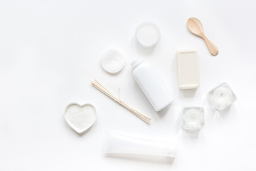 bodycare concept with white set of cosmetics woman desk top view mock-up