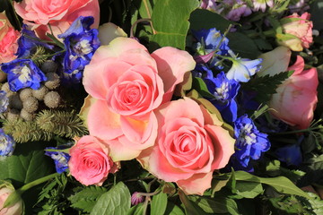 Pink roses and blue larkspur