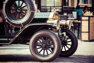 old fashioned car on the street of Torun, Poland