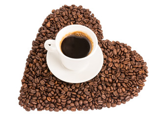 coffee cup in a heart of brown roasted coffee beans isolated on white background