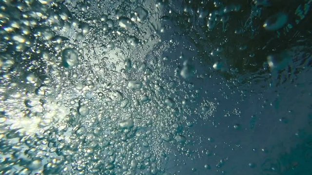 Slow motion : Air bubble Floating up to water surface 
