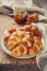 Fresh croissant with jam