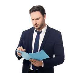 Handsome young man posing with clipboard on white background