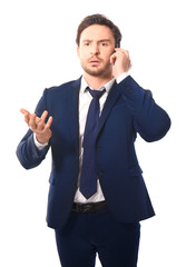 Handsome young man posing with phone on white background