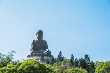 Big buddha at top of mountain in hong kong