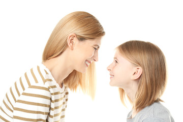 Happy mother and daughter on white background