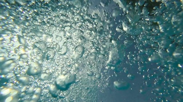 Slow motion : Air bubble Floating up to water surface 
