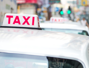 Taxi sign on the street, Hong Kong. selective focus
