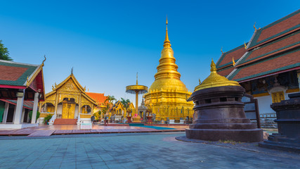 Hariphunchai massive gold stupa of Lamphun province, the tourist attraction of northern Thailand. This temple is very old and large with a museum with artefacts from the 12 th and 13th century