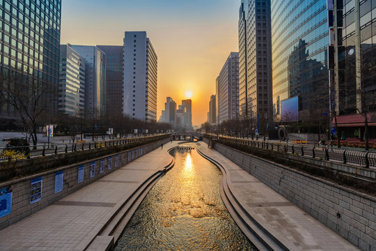 Cheonggyecheon Stream and Seoul city skyline when sunrise, Seoul, South Korea