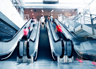 People rushing in the lobby. motion blur