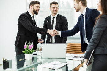 handshake of the Manager and the client prior to conclusion of contract in a modern office