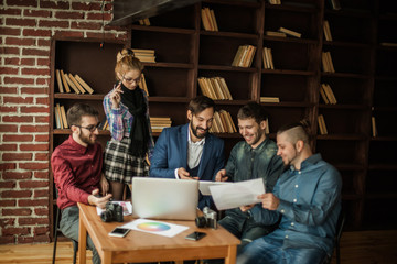 design team is discussing a new advertising project