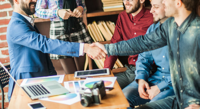 Handshake Business Partners At A Meeting In Creative Office