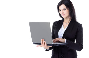 Businesswoman working at a laptop full length isolated, white background