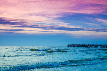 Obraz premium Sunset over the sea in Palanga, Lithuania