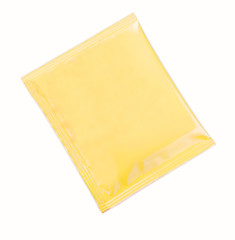 Blank yellow plastic sachet for medicine, drugs, coffee, sugar, salt, spices