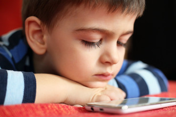 Little boy with tablet - digital era 