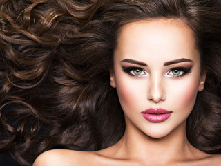 Beautiful woman with long bown hair