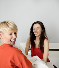 Fototapeta premium Woman in a pillow fight