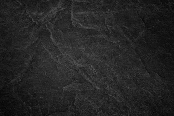 Dark grey black slate background or texture.