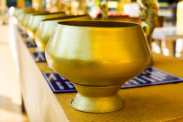 buddhist golden monk's alms