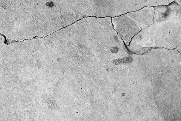 Crack white concrete texture close up background.