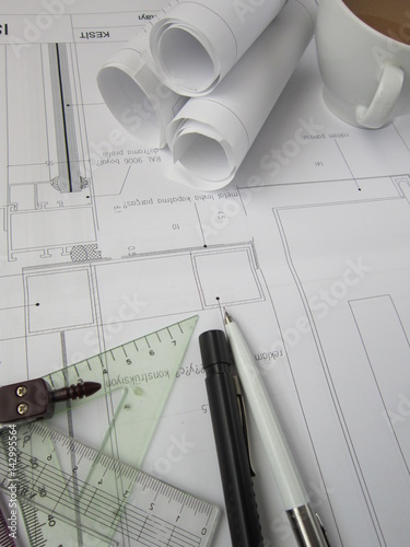 Architectural Drawing Materials coffee on the table,the project, drawing materials,architectural Architectural Drawing Materials coffee on the table,the project, drawing materials,architectural