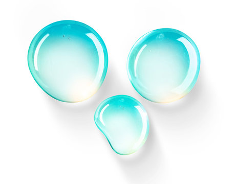 Set of three drops  of water beautifully rounded form turquoise color with bright highlights on a white background close-up macro. Light airy drops.
