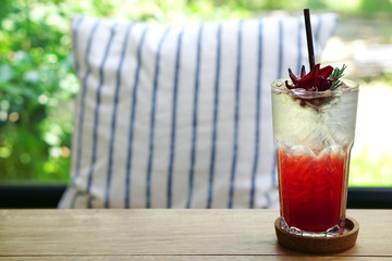 Roselle Iced Tea Mocktail with lemon or Hibiscus sabdariffa Tea is a herbal tea made as an infusion from crimson of the roselle flower, Healthy Drink Concept.