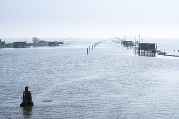 Fishing houses in the lagoon of Comacchio, Italy