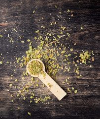 Dried marjoram spice on wood background,Origanum majorana