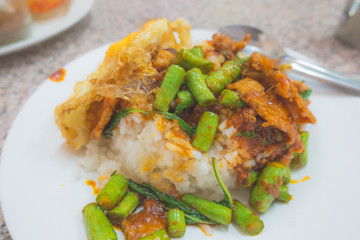 Fried pork curry, Stir fried pork and red curry paste with sunny side up egg