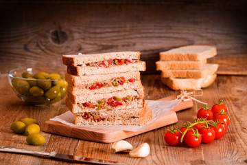 Tuna, olives and tomato sandwiches. 