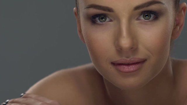 Beautiful young woman face close-up. 