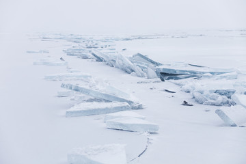 Fototapeta na wymiar Ice floe. Winter landscape. Ice-drift of Baikal lake