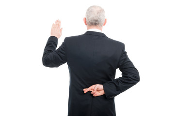 Back view aged elegant man making fake oath gesture
